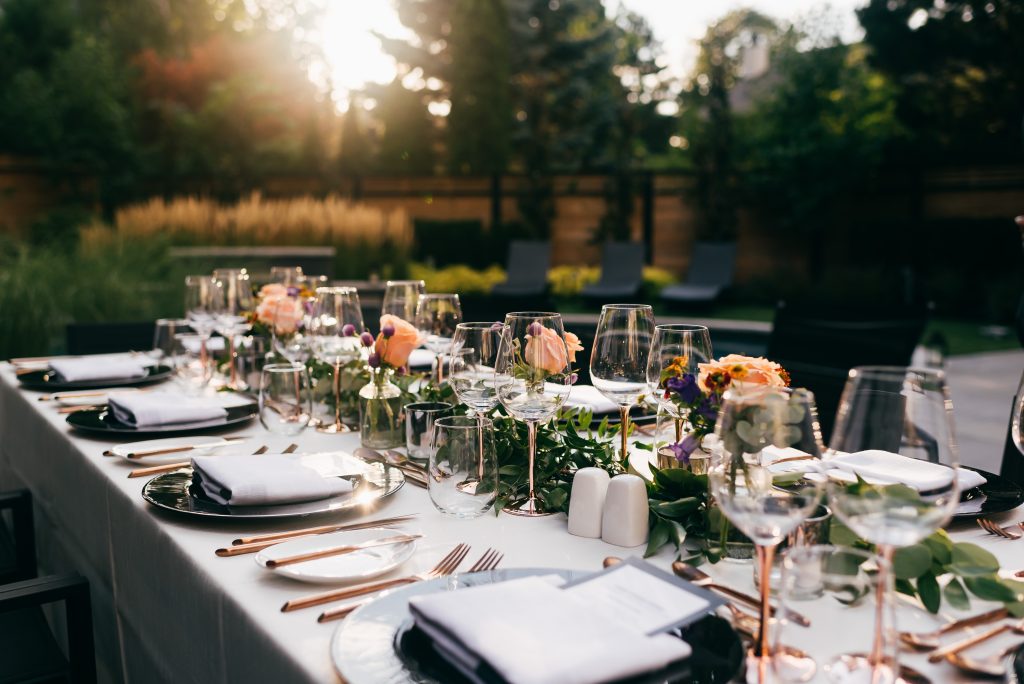 Outdoor white tablecloth table setting